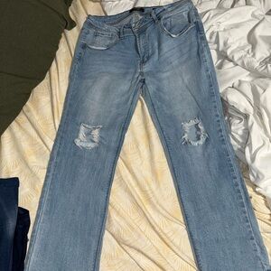 Distressed Light Blue Jeans